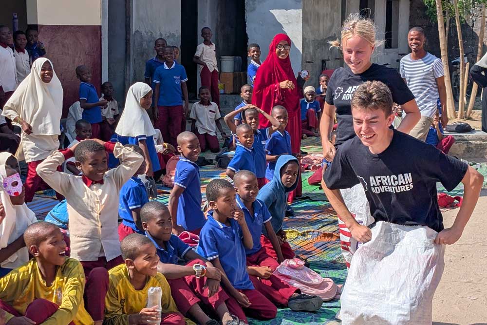 A photo of Penrice students in a fun sack race, taken in Zanzibar 2025