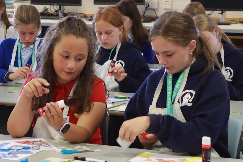 A photograph of students in an art class on Welcome Day 2025