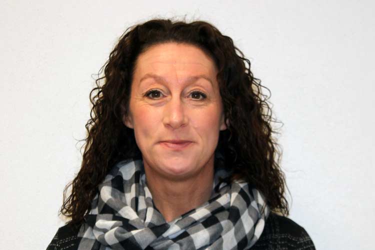 A portrait of Mrs M Thomas